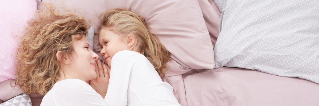 Girl looking into mother's eyes