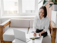 Young businesswoman working at home office.